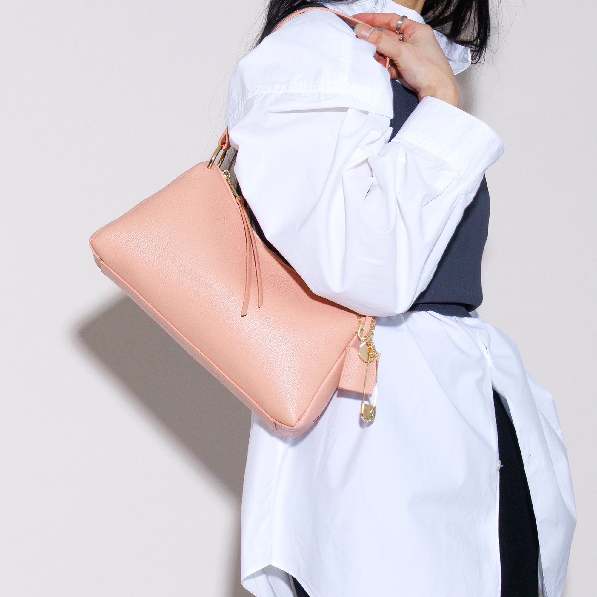 LEATHER CURVE TOP HANDBAG (Coral)